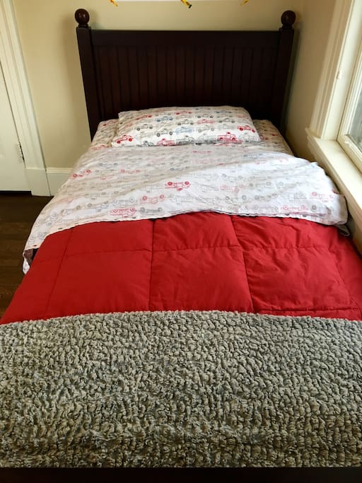 Cozy single/twin sized bed in second floor bedroom