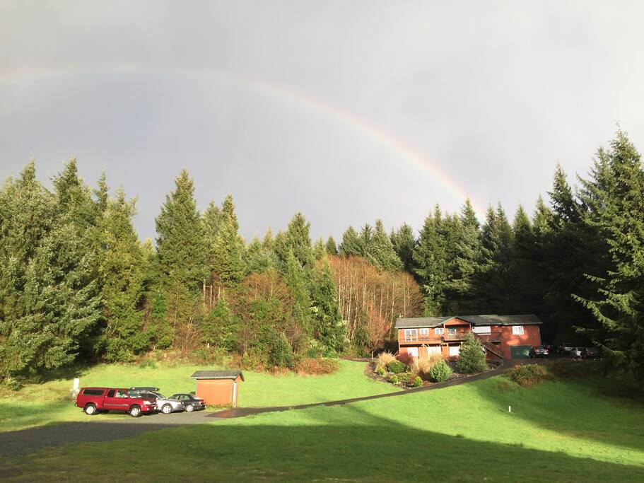 Our home at the end of the rainbow, tucked into the woods