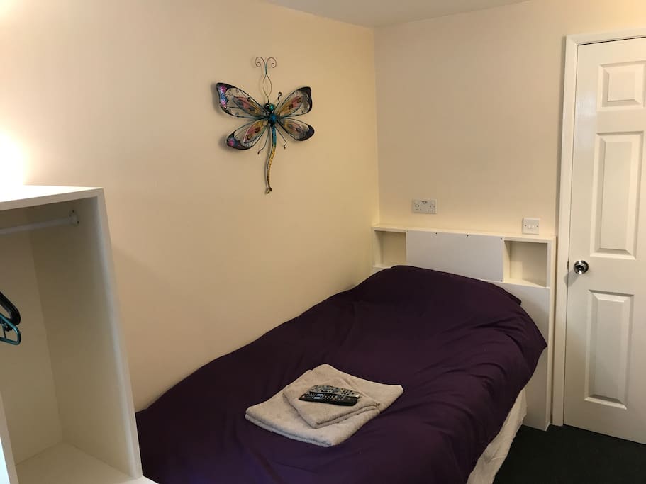 A comfy bed with bed lights