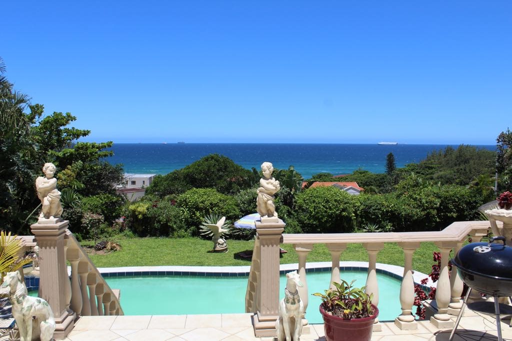 With a heavenly view of the Umhlanga ocean on the patio.