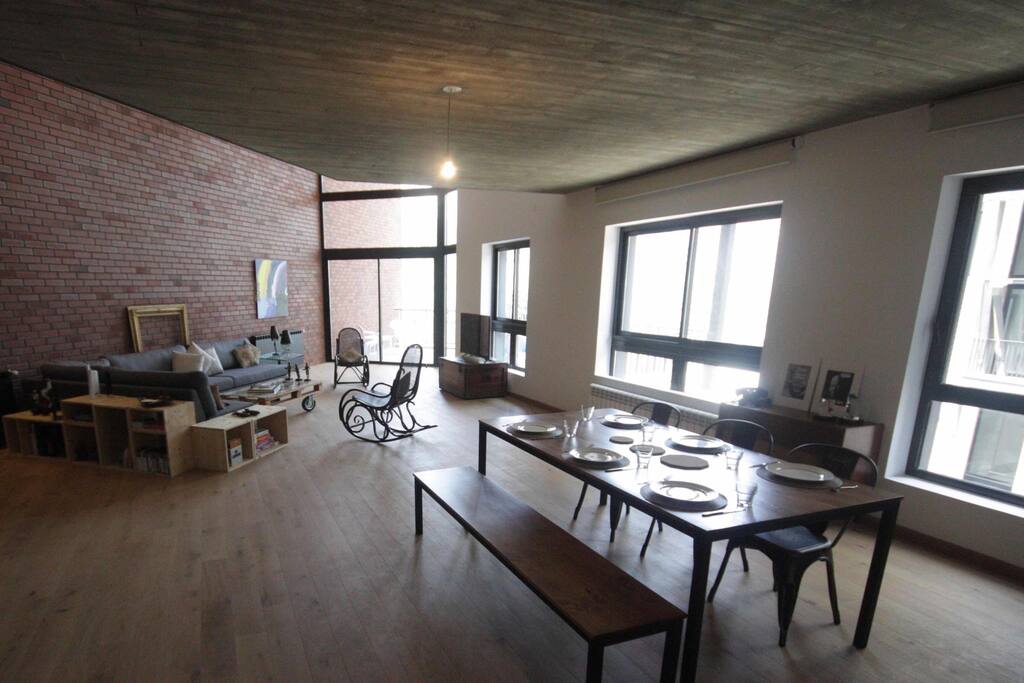 The dining area on the left of the lower open floor