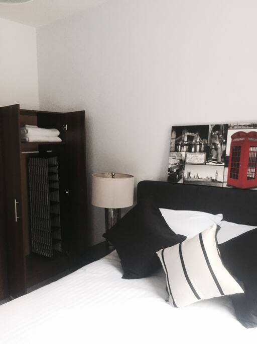 Large double wardrobe with built in shelves and mirror