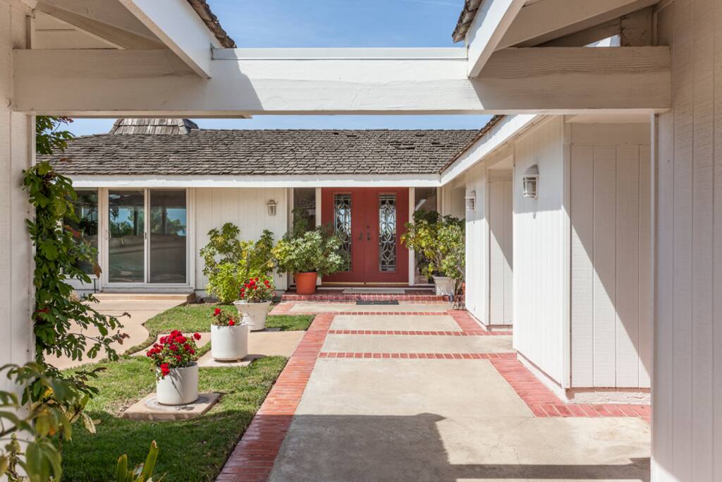 Enter the gates into the private courtyard