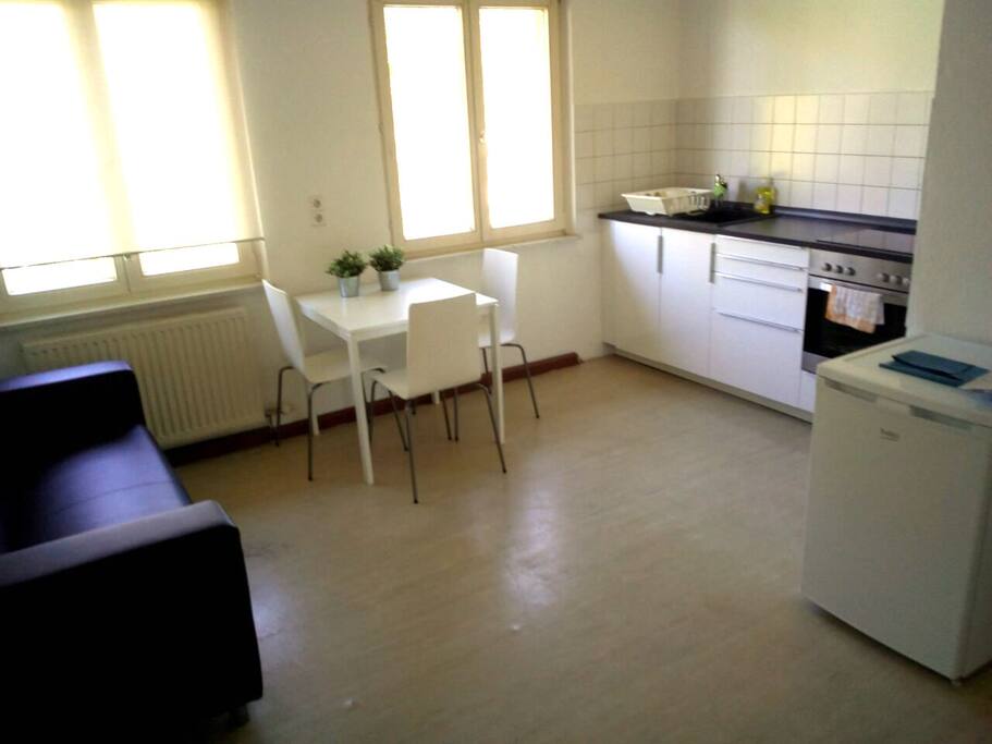 Living room with open plan kitchen