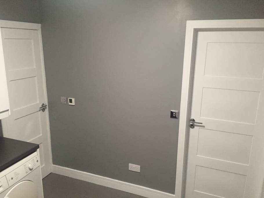 Shared entrance room, the self contained annexe is the right hand door and the main house is the left door