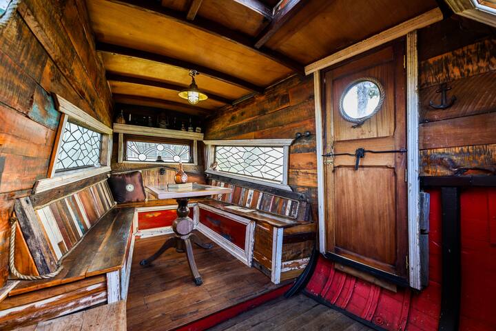 pirate ship treehouse with picnic tables