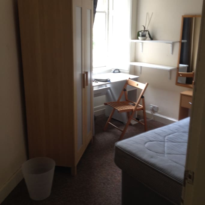 Each room has a double bed, wardrobe, desk or dressing table and mirror