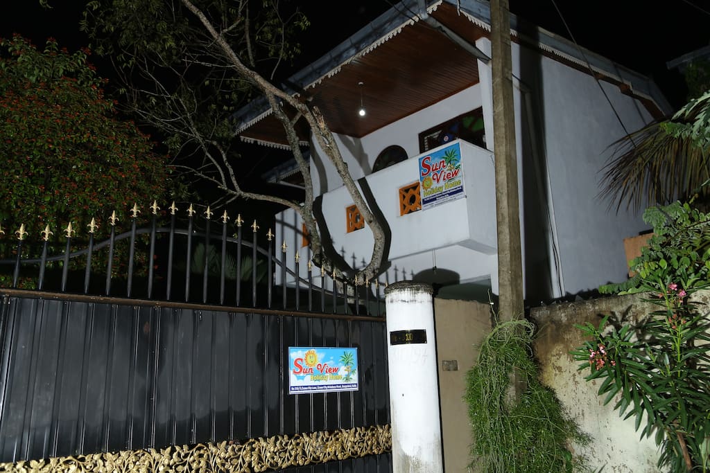 Entrance of the Guest House from the road.