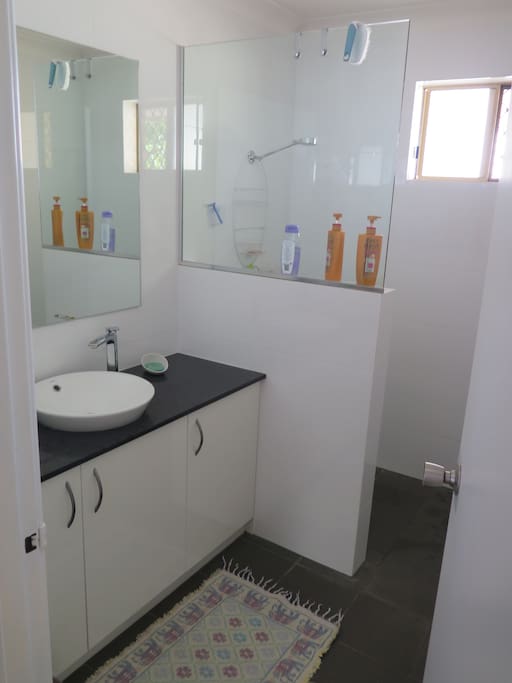 Shared bathroom, has ventilation and heat lights