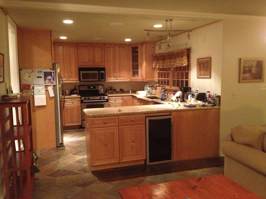 Modern kitchen. See the wine frig.