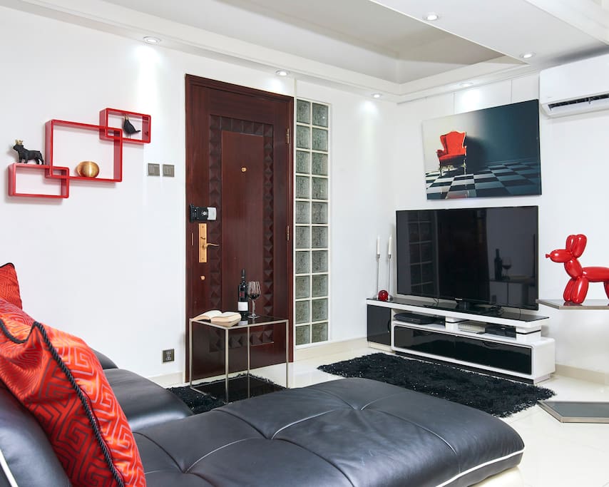 A lovely living room with L-shaped sofa where you can watch your favorite TV shows.