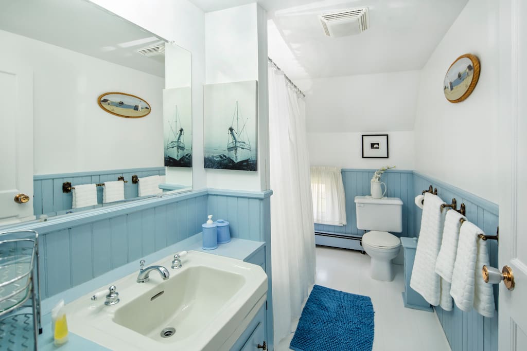 A bathroom that is across the hall and is shared with a smaller room which will soon be announced on airbnb.