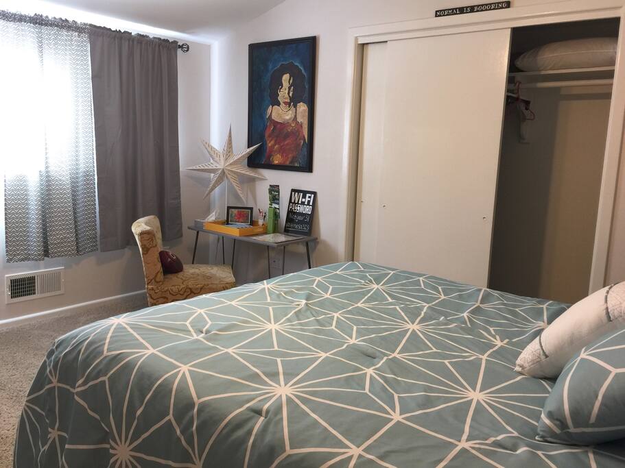 Queen sized bed with storage drawers under the bed. Also features a large closet and desk.