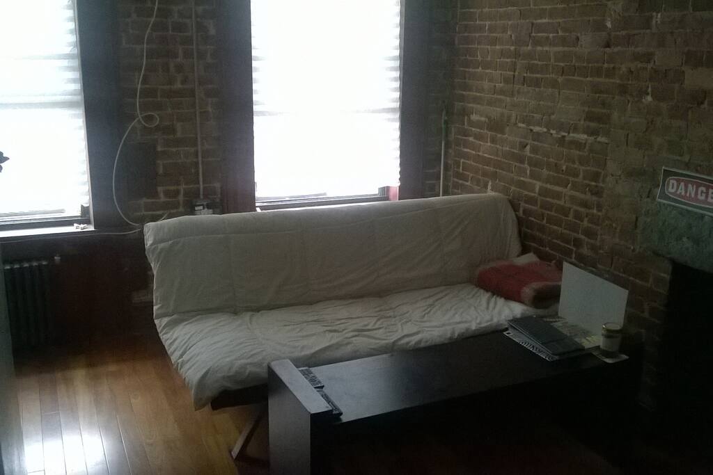 living room (futon + table + windows)