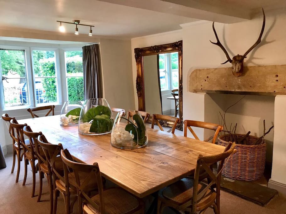 The dining table seats 12-14.