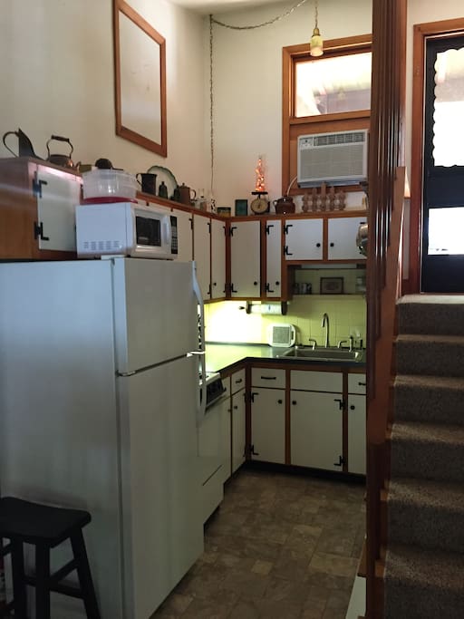 Fully furnished kitchen with all cooking capabilities.