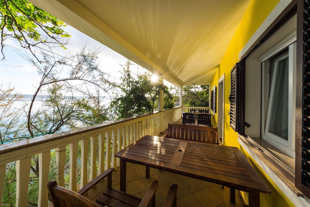 your room window, overlooking the terrace and the sea