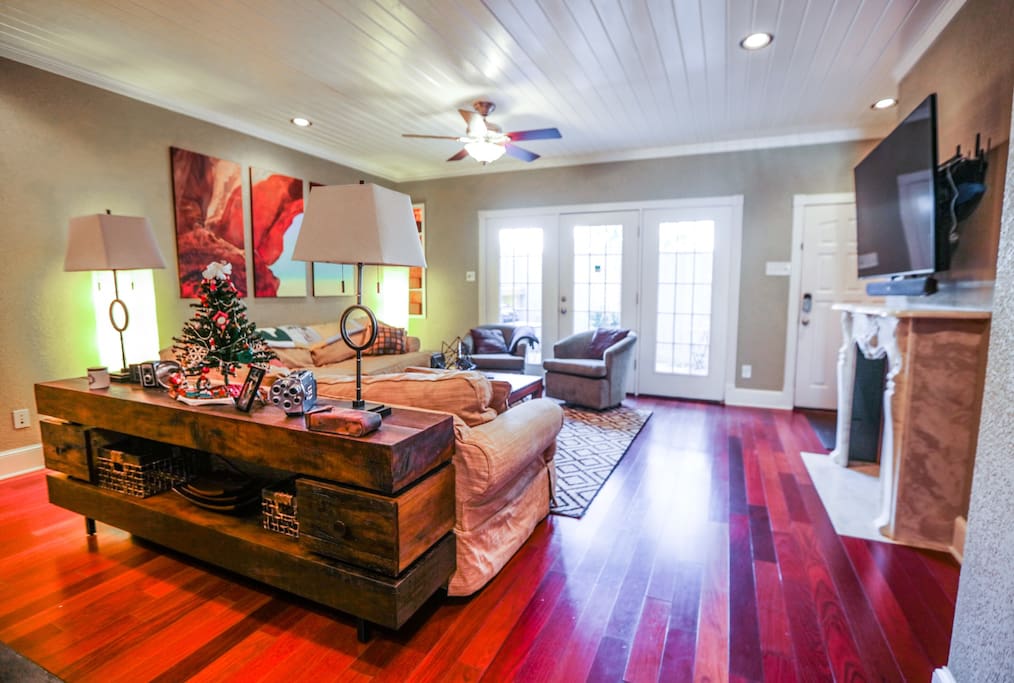 Another angle showing off the high-style this town home boasts. The elegant furniture & top of the line technology mesh well in this space. Surf the Internet with Ultra High-Speed Internet at 250mbps and jam to your favorite music via Bluetooth or AUX cord on the TV's Sound Bar / rear Sub-Woofer