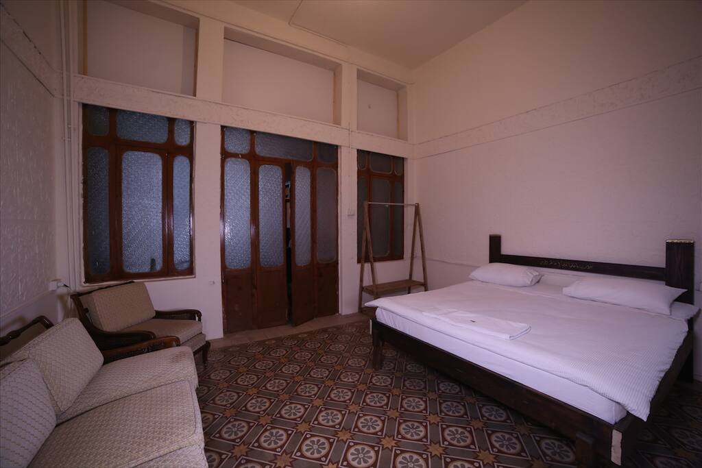 Couches and clothes hanger in your room