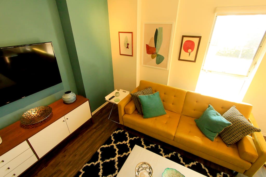Living room with 55 inch TV and Roku