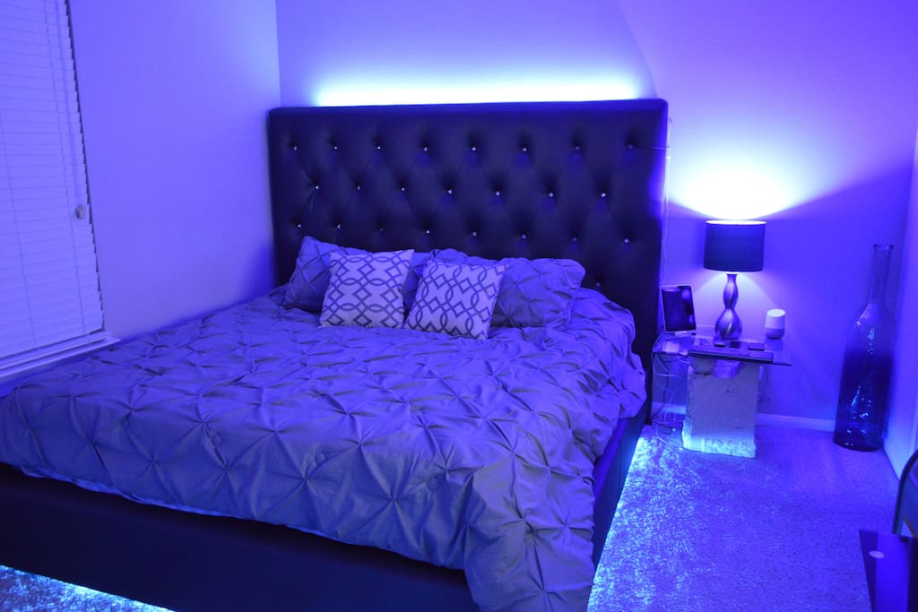 King Contemporary bed in Master Suite with voice activated lighting and home automation