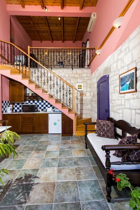 living room with stairs leading to the bedroom 1