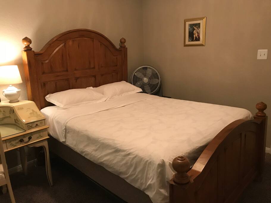 The guest’s cozy room with one queen bed on the 2nd floor