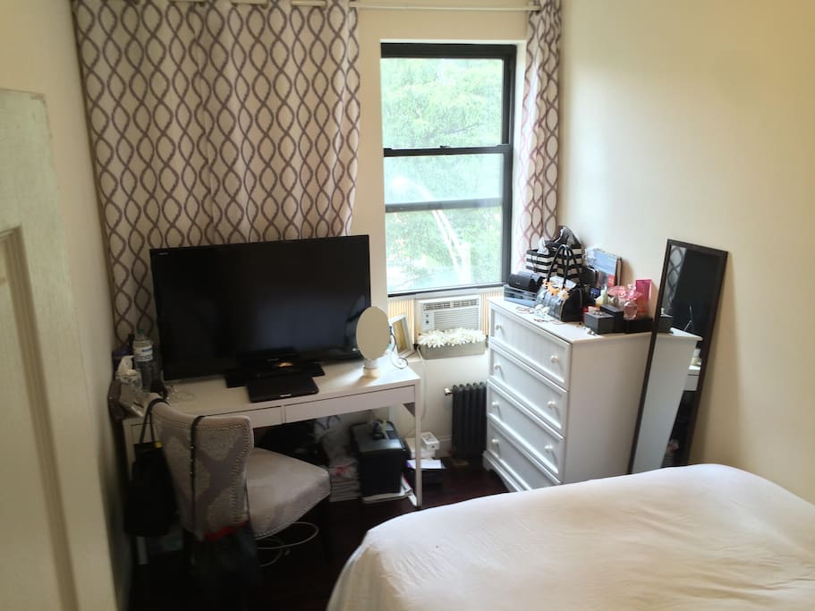 Bedroom with Full Sized Dresser and Chair/Desk