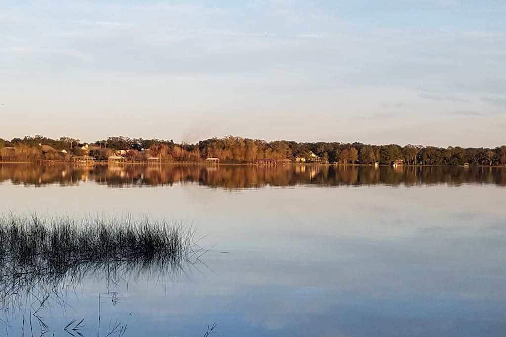 Sun beginning to set, beautiful reflection across the lake