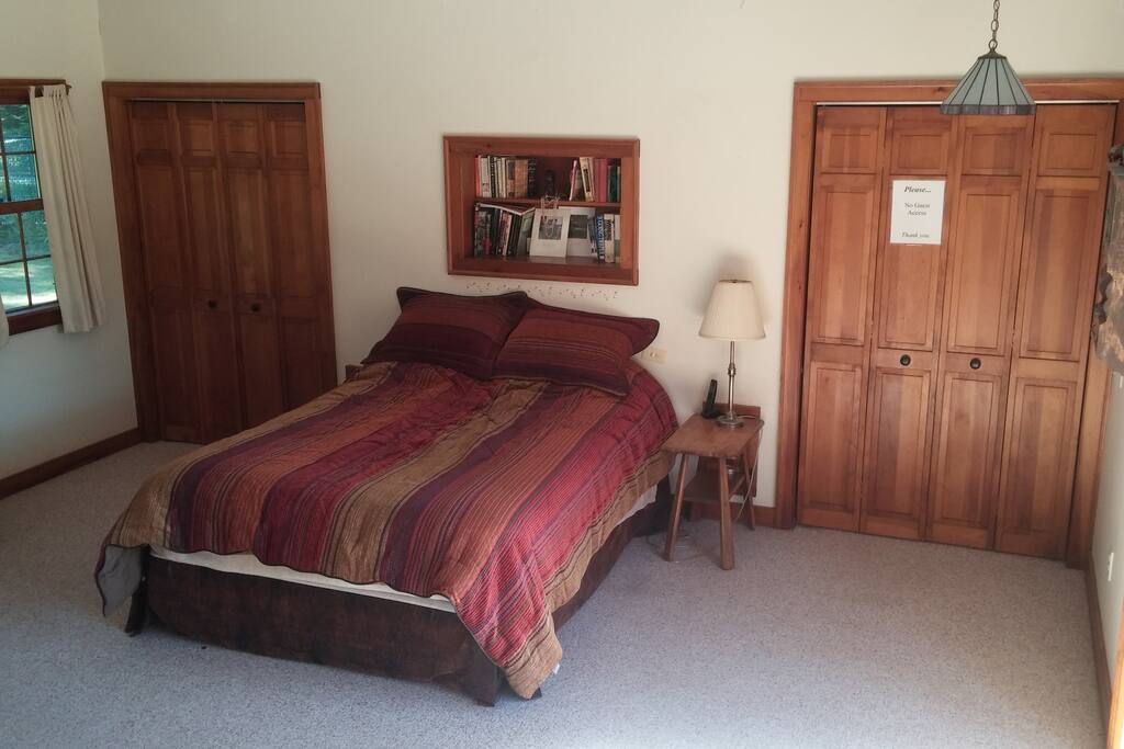 The master bedroom is spacious with large walk-in closets