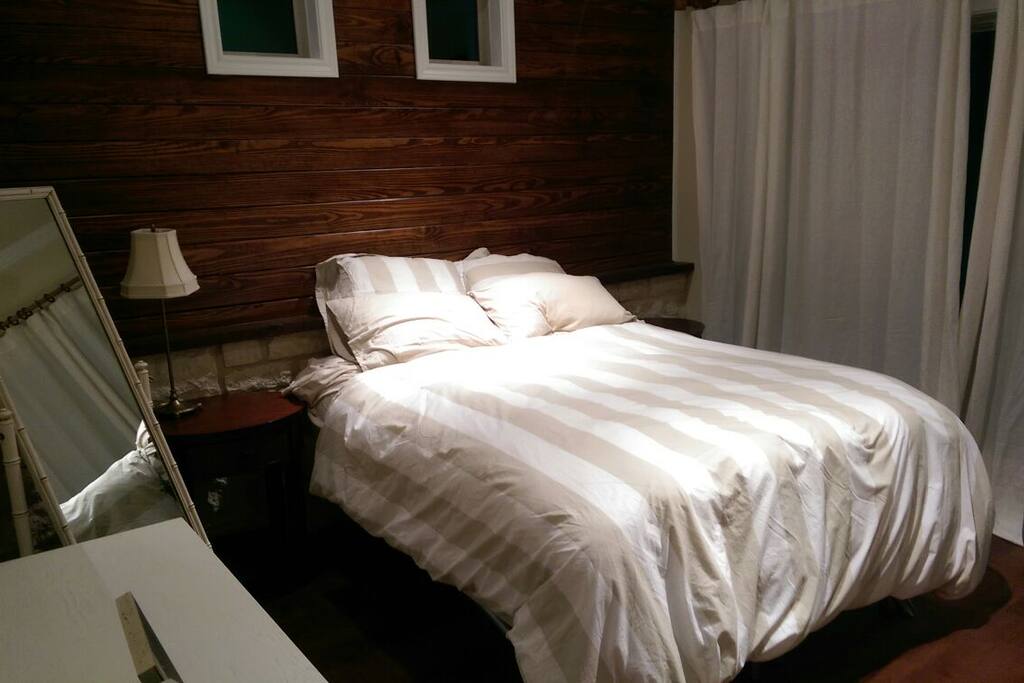 Queen bed, fully furnished bedroom.