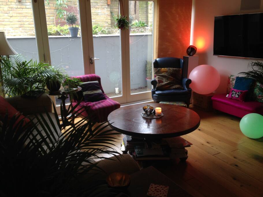 Large seating area with doors onto secure outside area