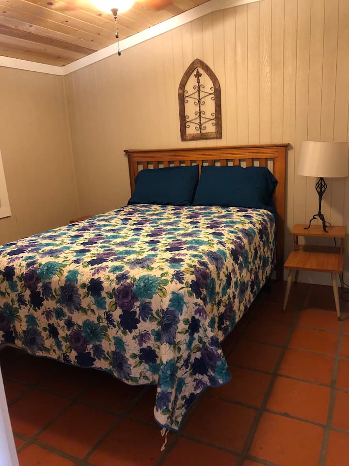 Bedroom 2 has a queen size bed.