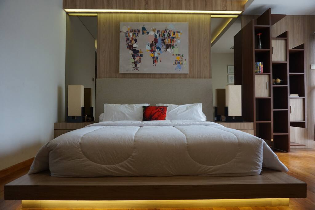 Comfortable bed with latex mattress and cozy pillows