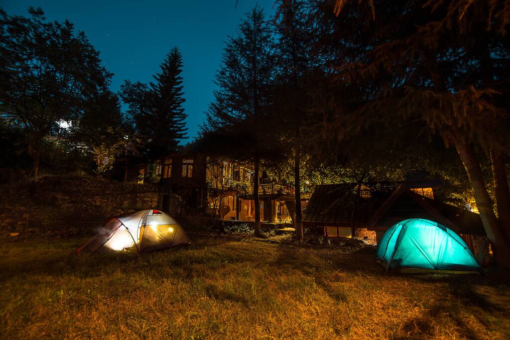 view of cottage at night