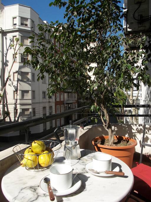 Lovely balcony provides a great perch for watching city life.