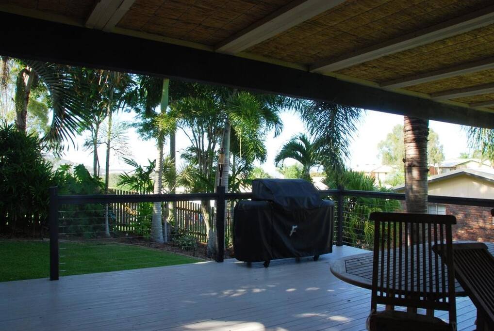Entertainment Deck: Sea views, BBQ, spa, partly under cover, table and chairs, tropical gardens.