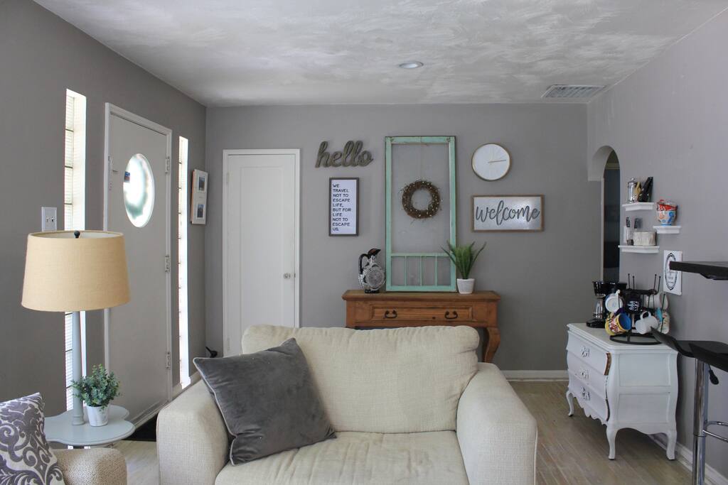 Living room, coffee bar and front entry