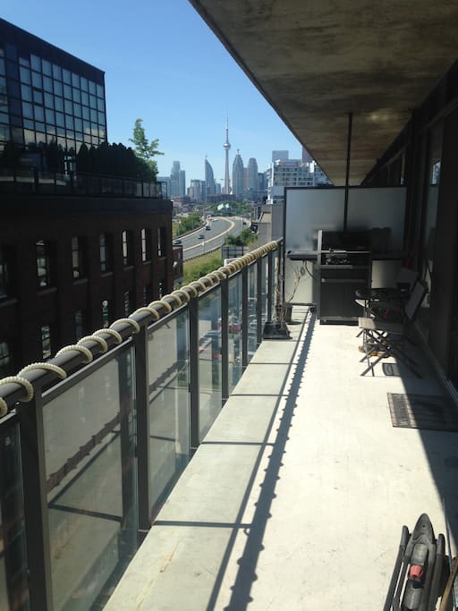 Great view of CN tower on large balcony