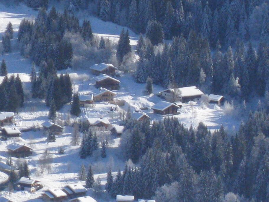 Piste at top of picture and Snowbay 2nd Chalet below