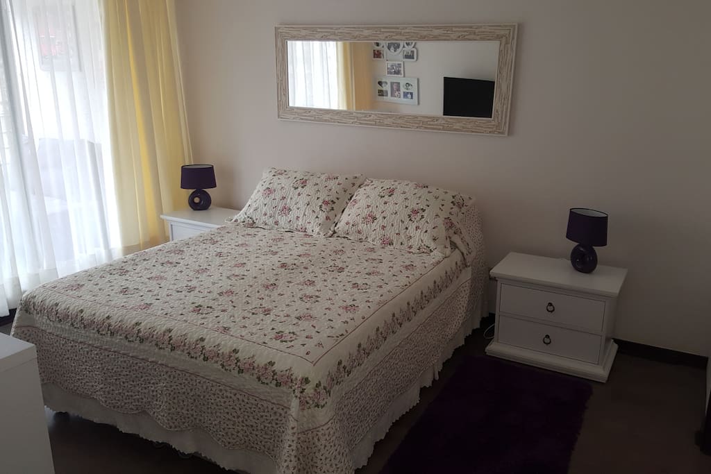 Bedroom with access to private balcony