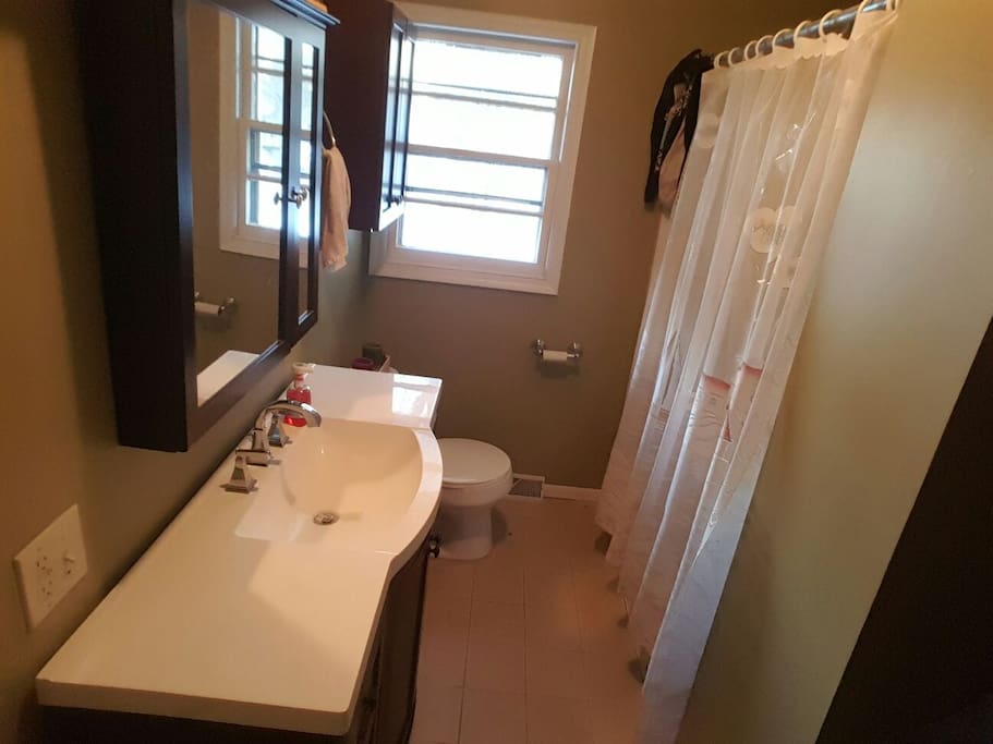 Newly finished full bath with shower/bathtub.