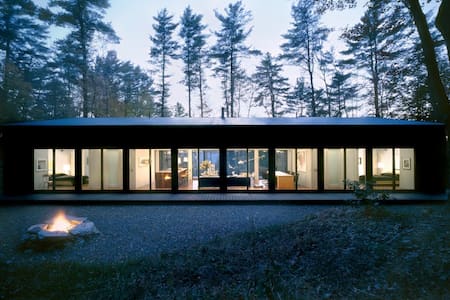 Glass Cabin in the Woods