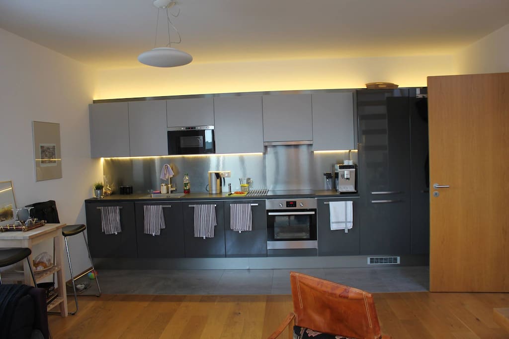 Kitchen with stove, oven, microwave and fridge - cooking is optional ;)