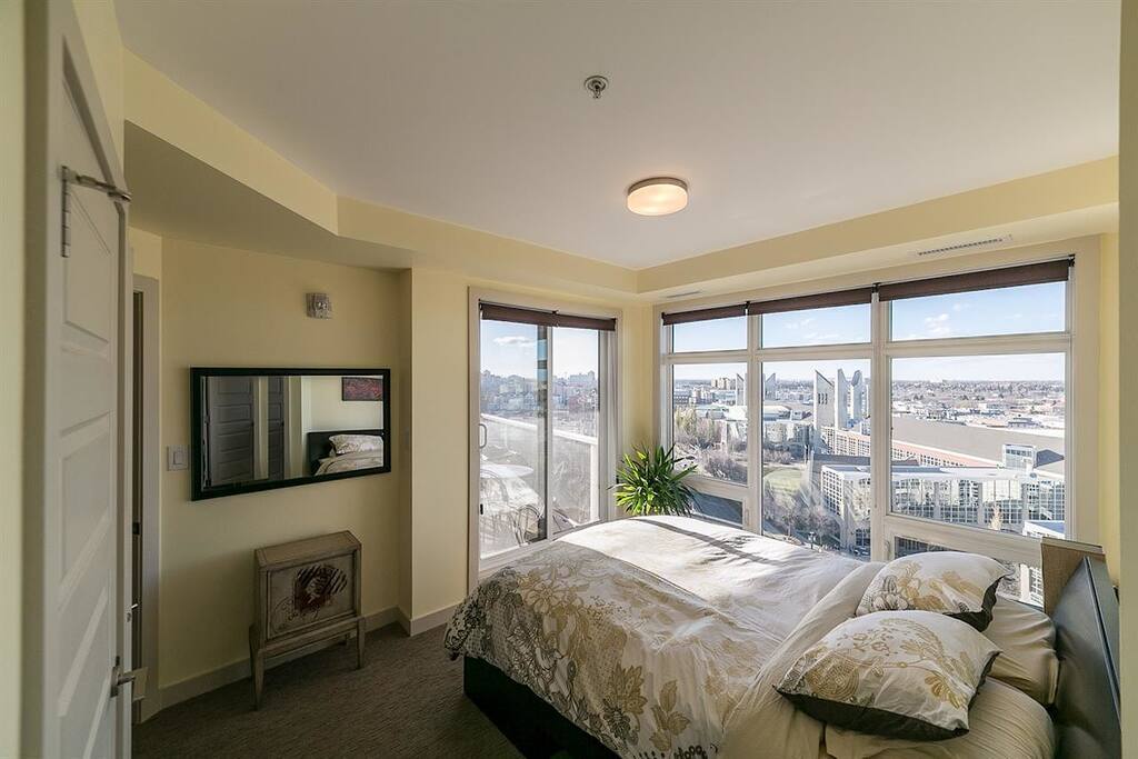 Master suite with two walls of windows