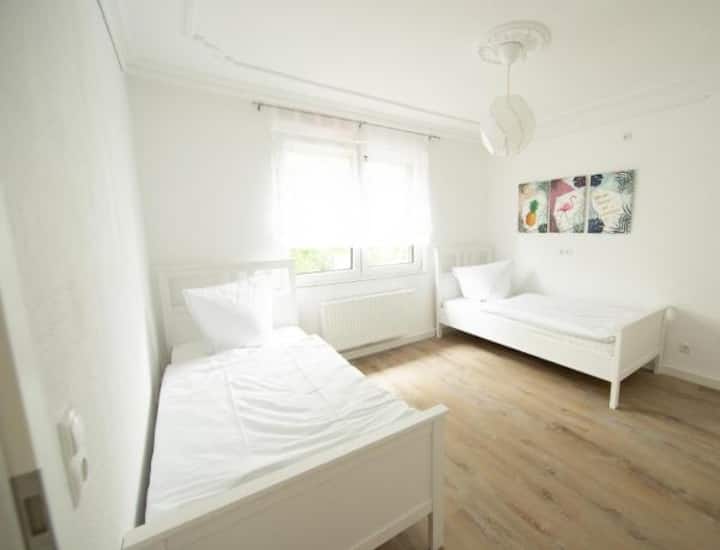 Bedroom no. 1 two single beds and a closet. The single beds can be placed together to form a double.