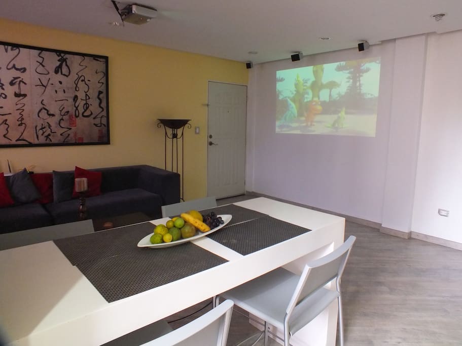 Dinning / Living Room with TV video projector.
