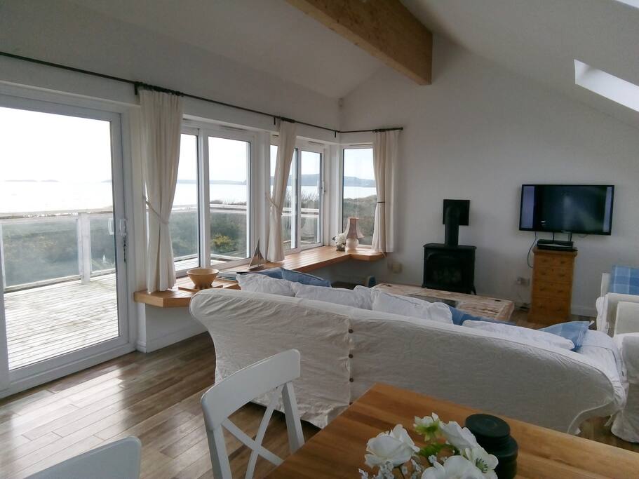 The top floor lounge, overlooking the sea towards Abersoch with a fabulous balcony complete with Picnic table..