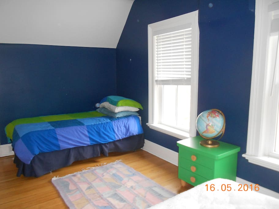 Upstairs bedroom with single bed for adult or child