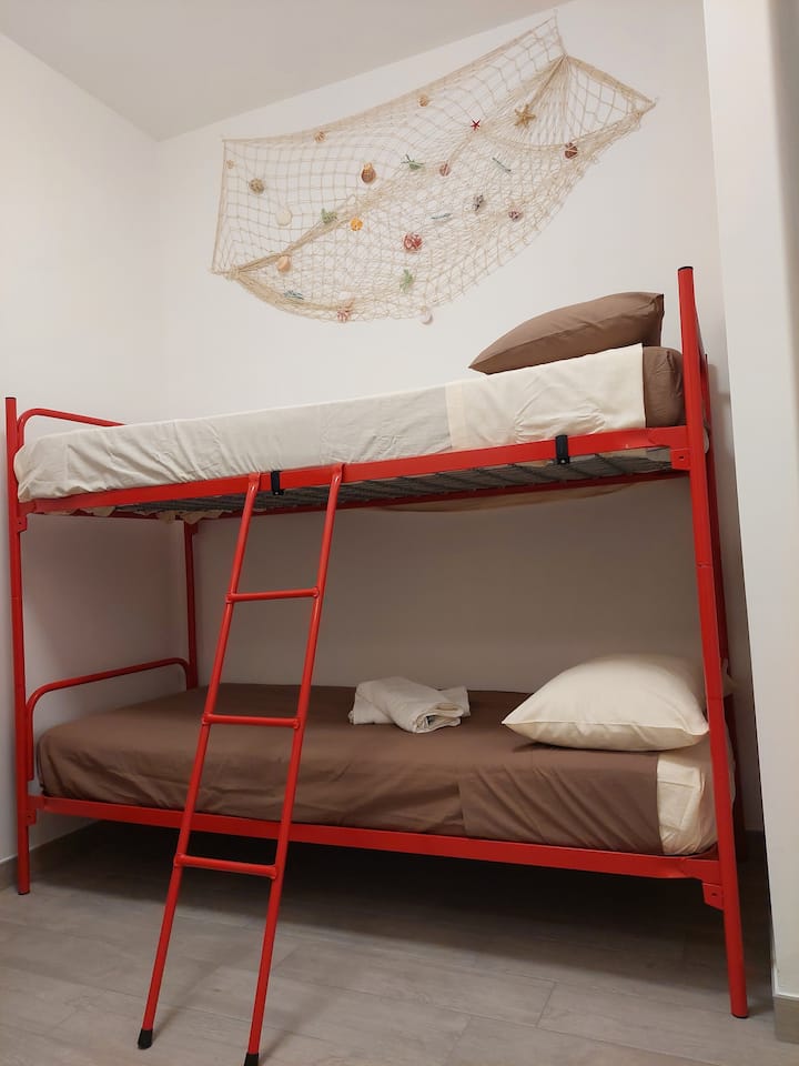comfortable bunk bed with antique rails available